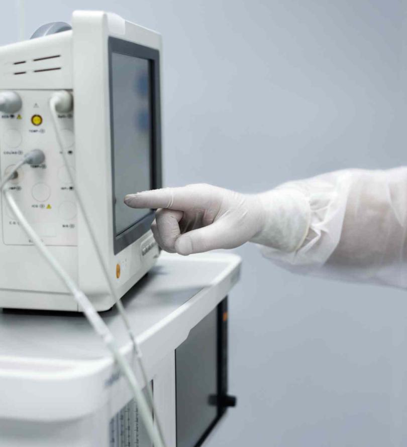 doctor-monitoring-patient-s-pulse